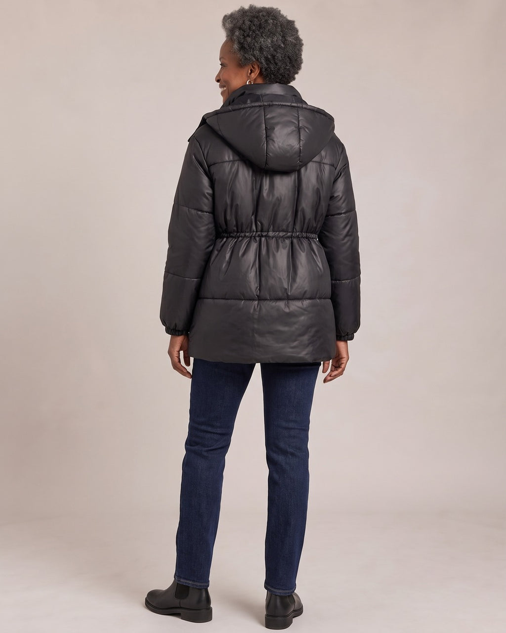 Hooded Belted Puffer Jacket worn by a model, back view