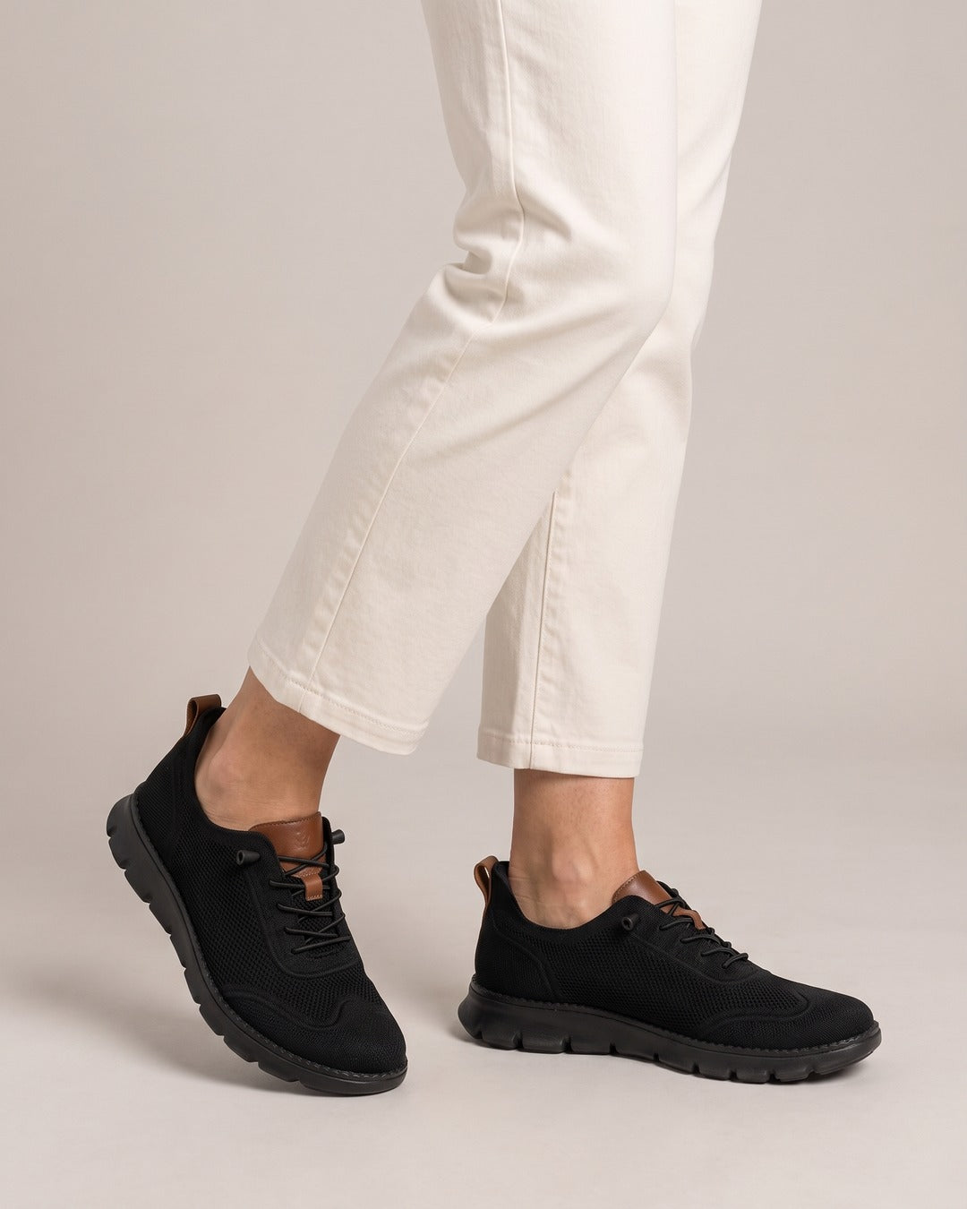 Hands-Free Slip-On Knit Shoe in Black, worn
