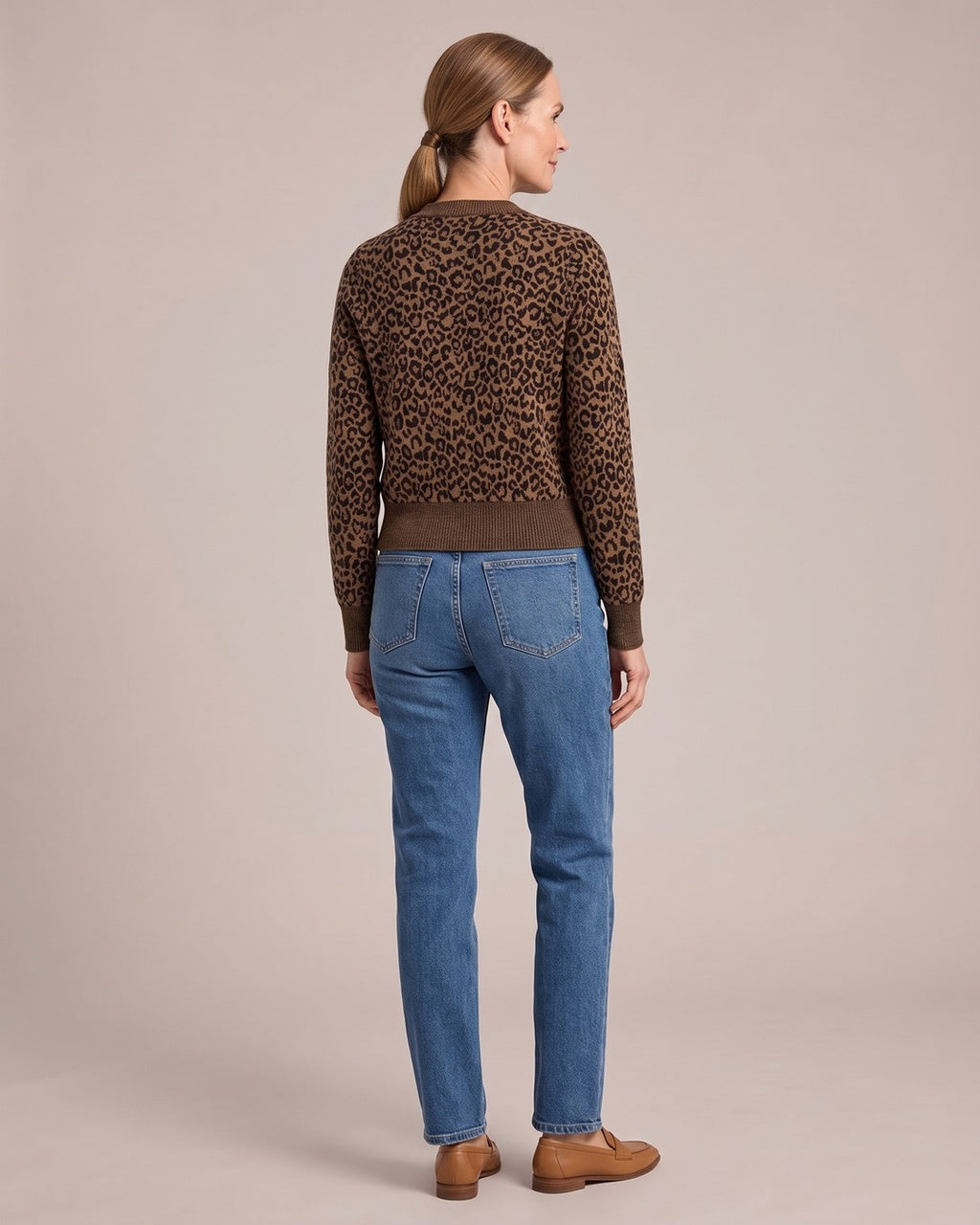 Molly | Leopard Knit Cardigan worn by a model, back view