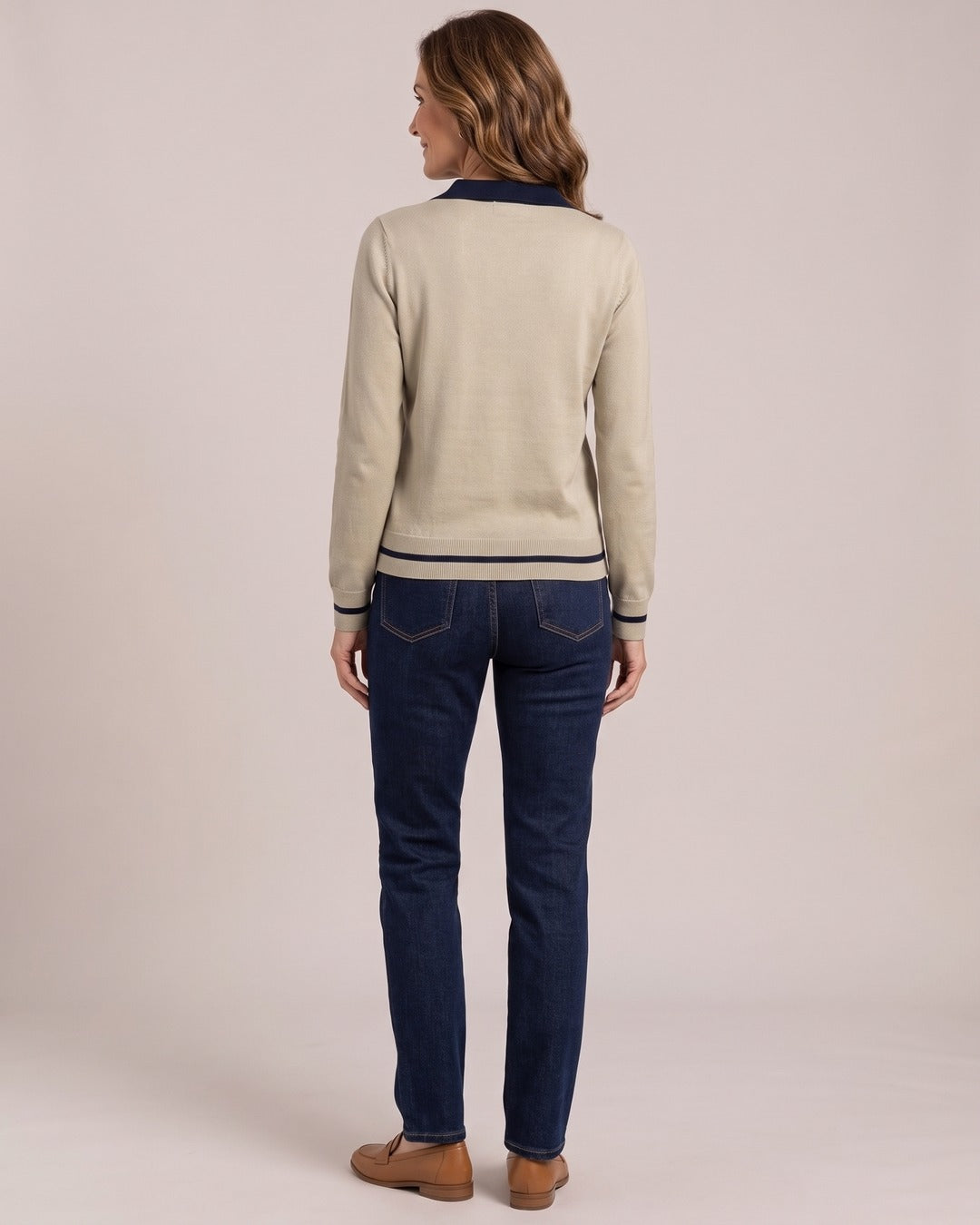 Isadora | Button-Placket Polo Jumper worn by a model, back view