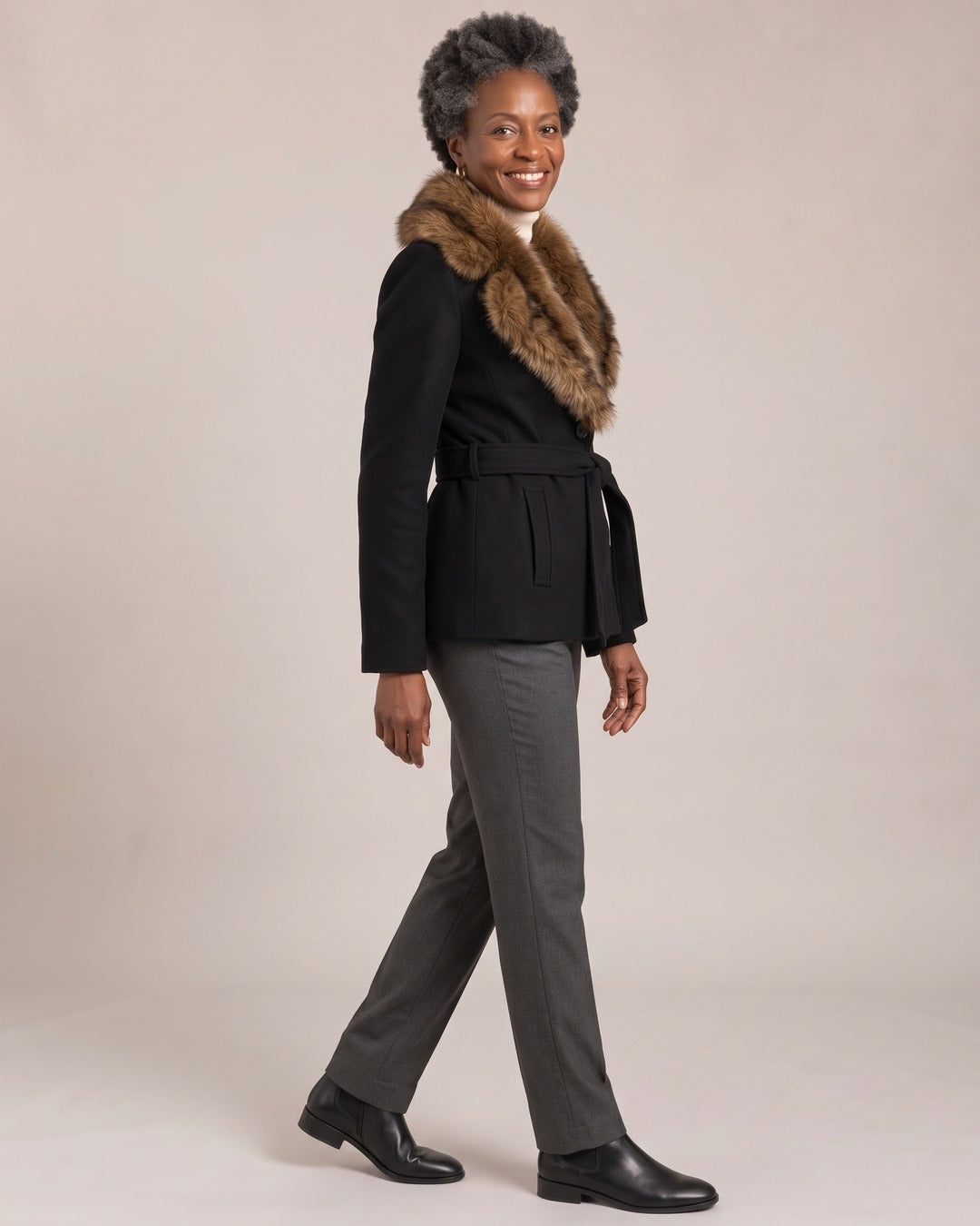 Belted Jacket with Faux Fur Collar worn by a model, side view