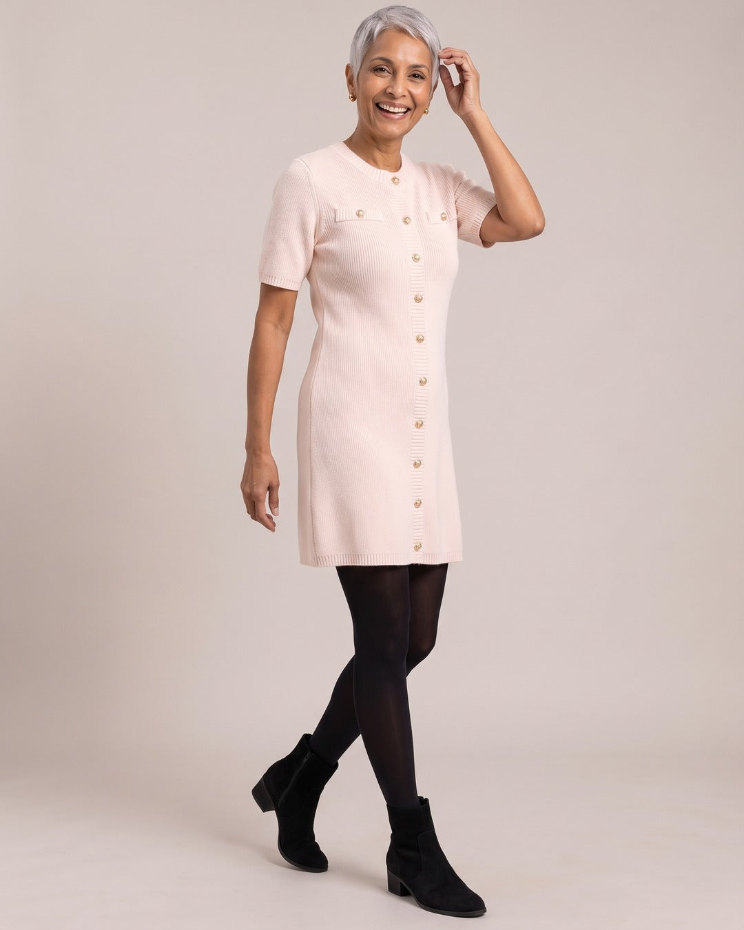 Knit Button-Front Mini Dress worn by a model, Light Pink