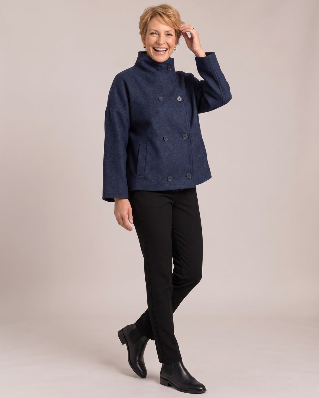 Funnel Neck Jacket worn by a model, Navy