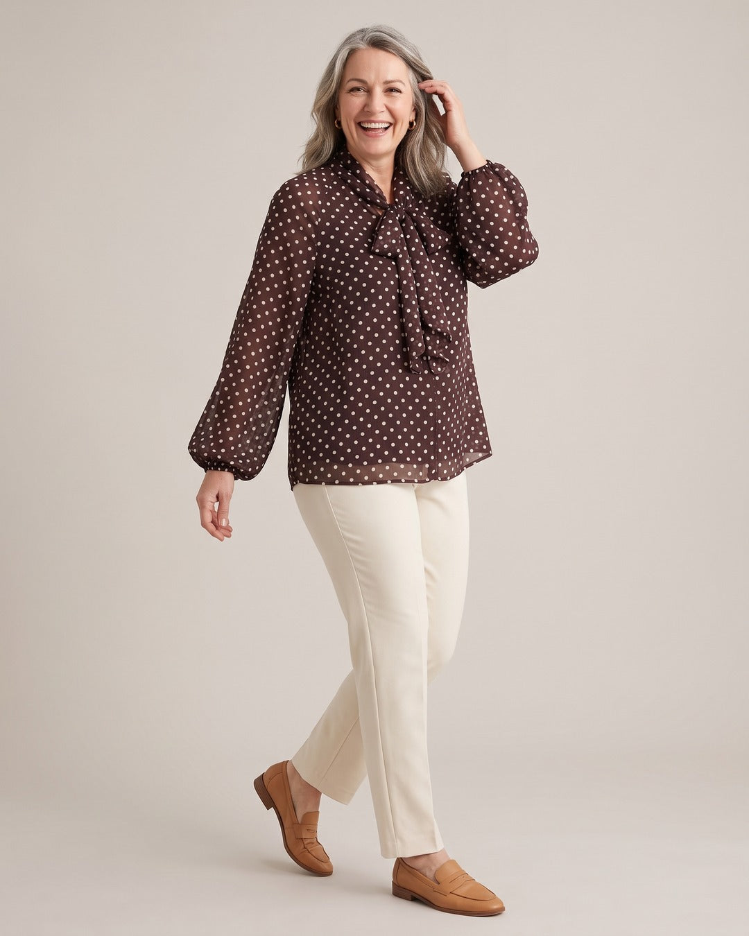 Polka Dot Blouse worn by a model