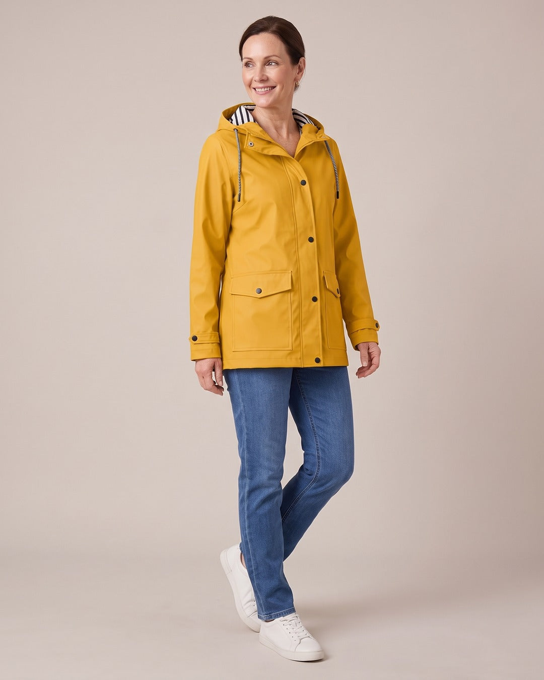 Hooded Trench Coat worn by a model, Yellow