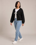 Scalloped Trim Cardigan worn by a model