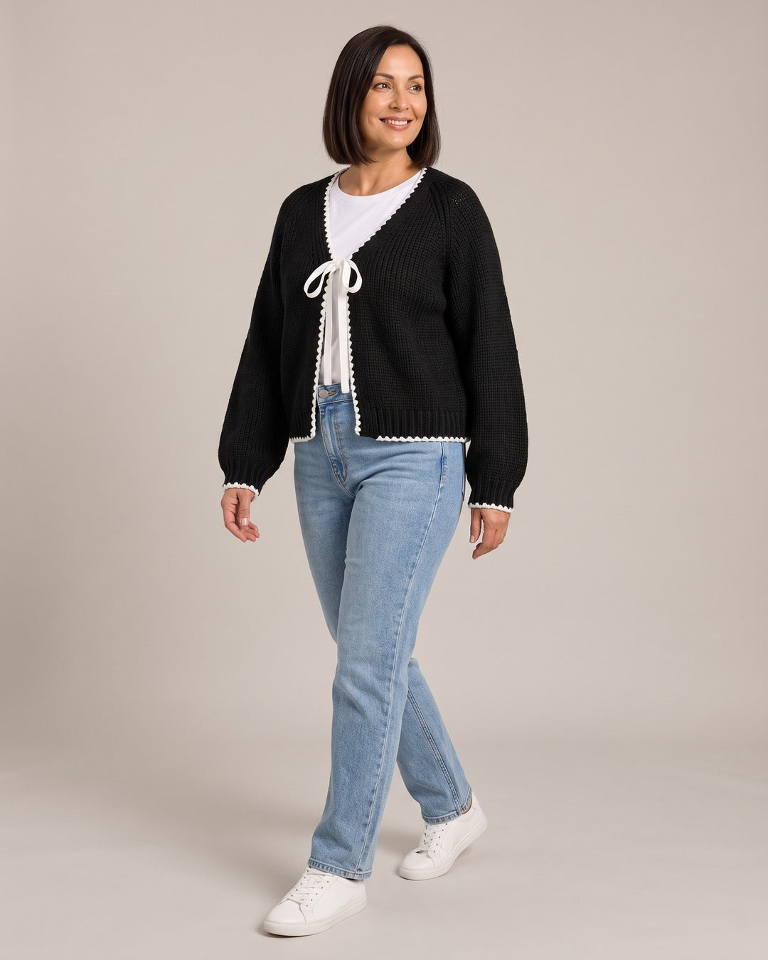 Scalloped Trim Cardigan worn by a model
