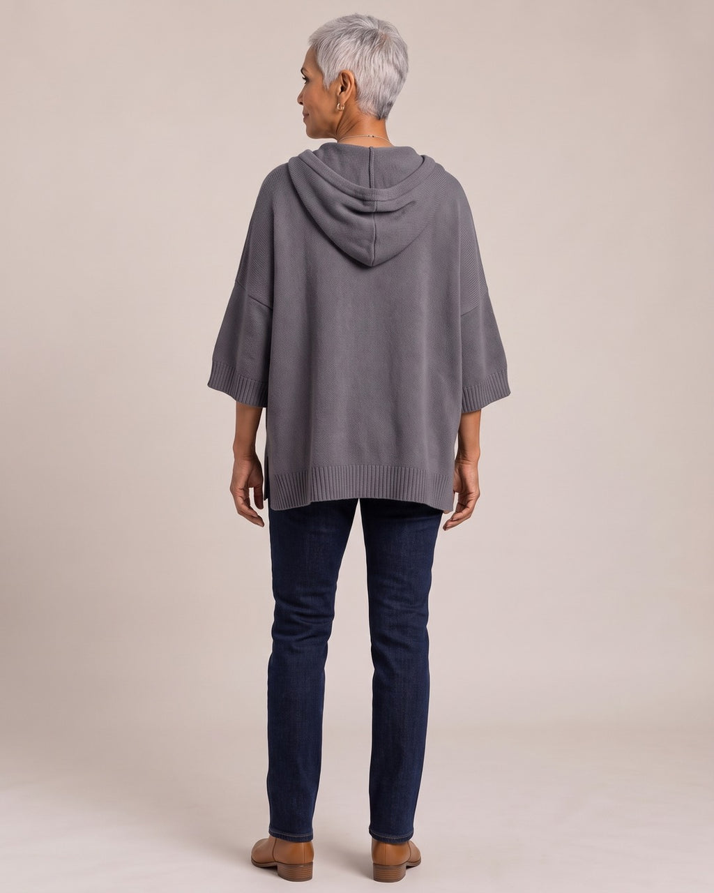 Oversized Knit Poncho Hoodie worn by a model, back view