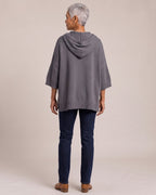 Oversized Knit Poncho Hoodie worn by a model, back view