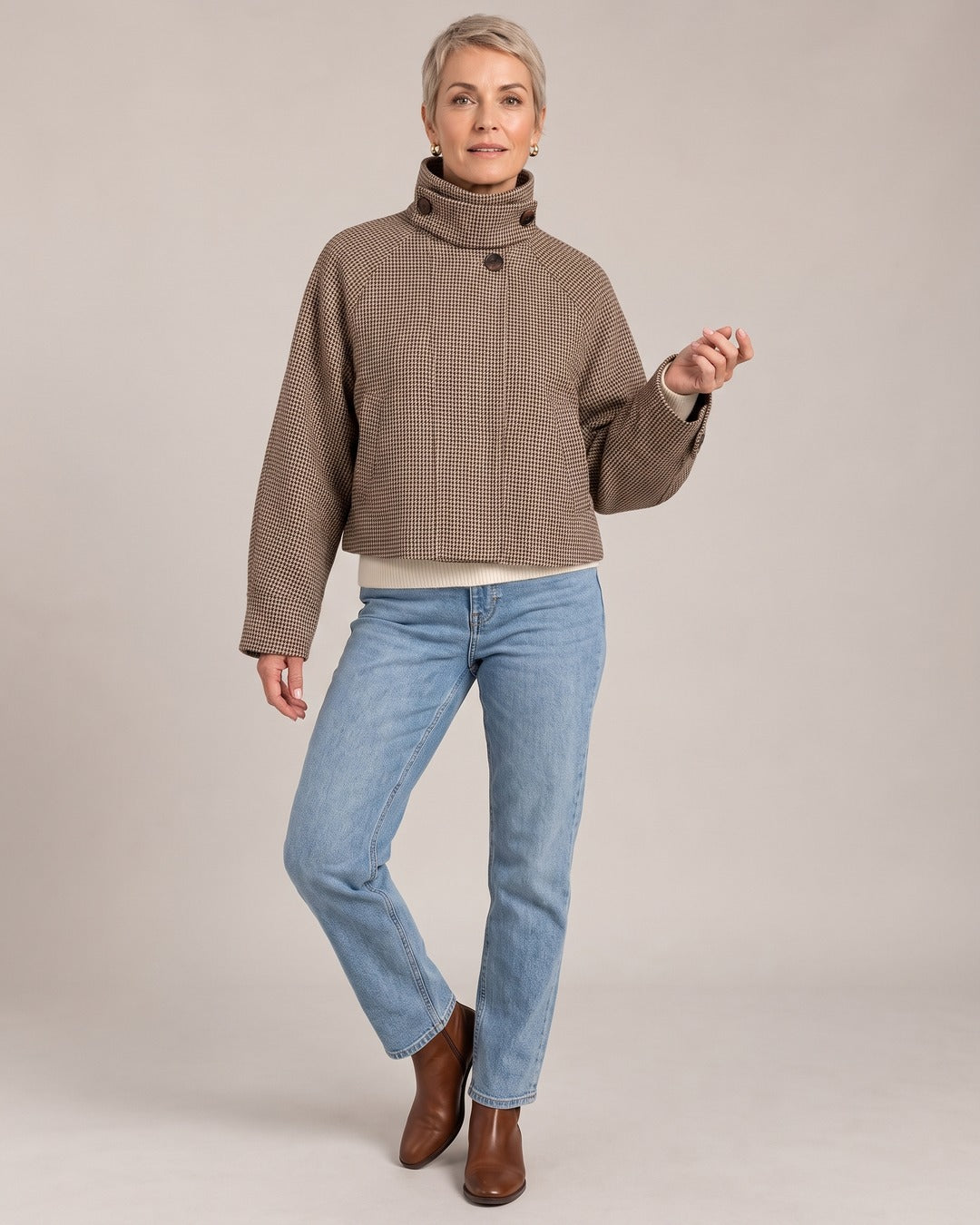 Funnel-Neck Cropped Jacket worn by a model