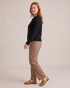 Crew-Neck Button Cardigan worn by a model, side view, Black