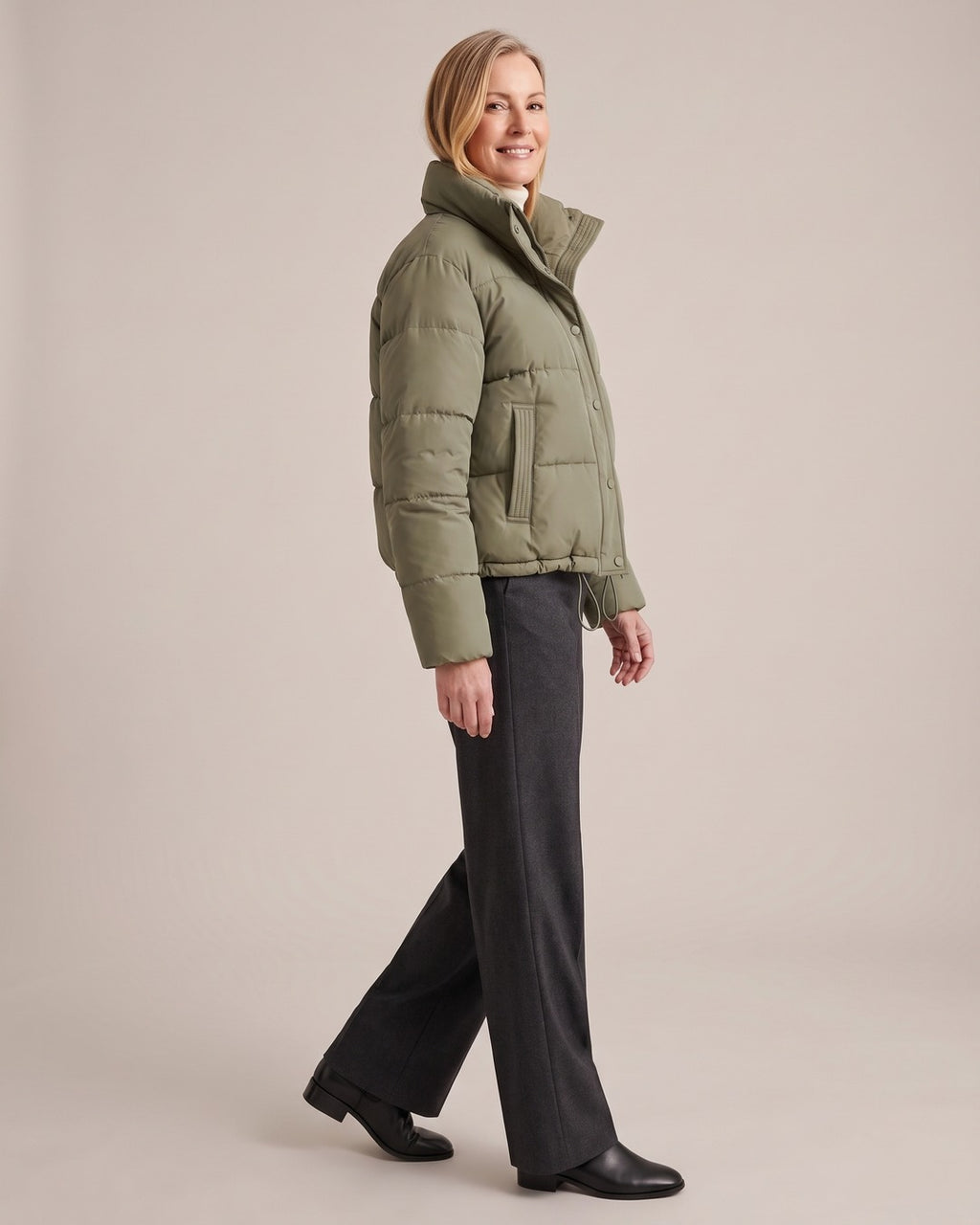 Cropped Puffer Jacket worn by a model, side view