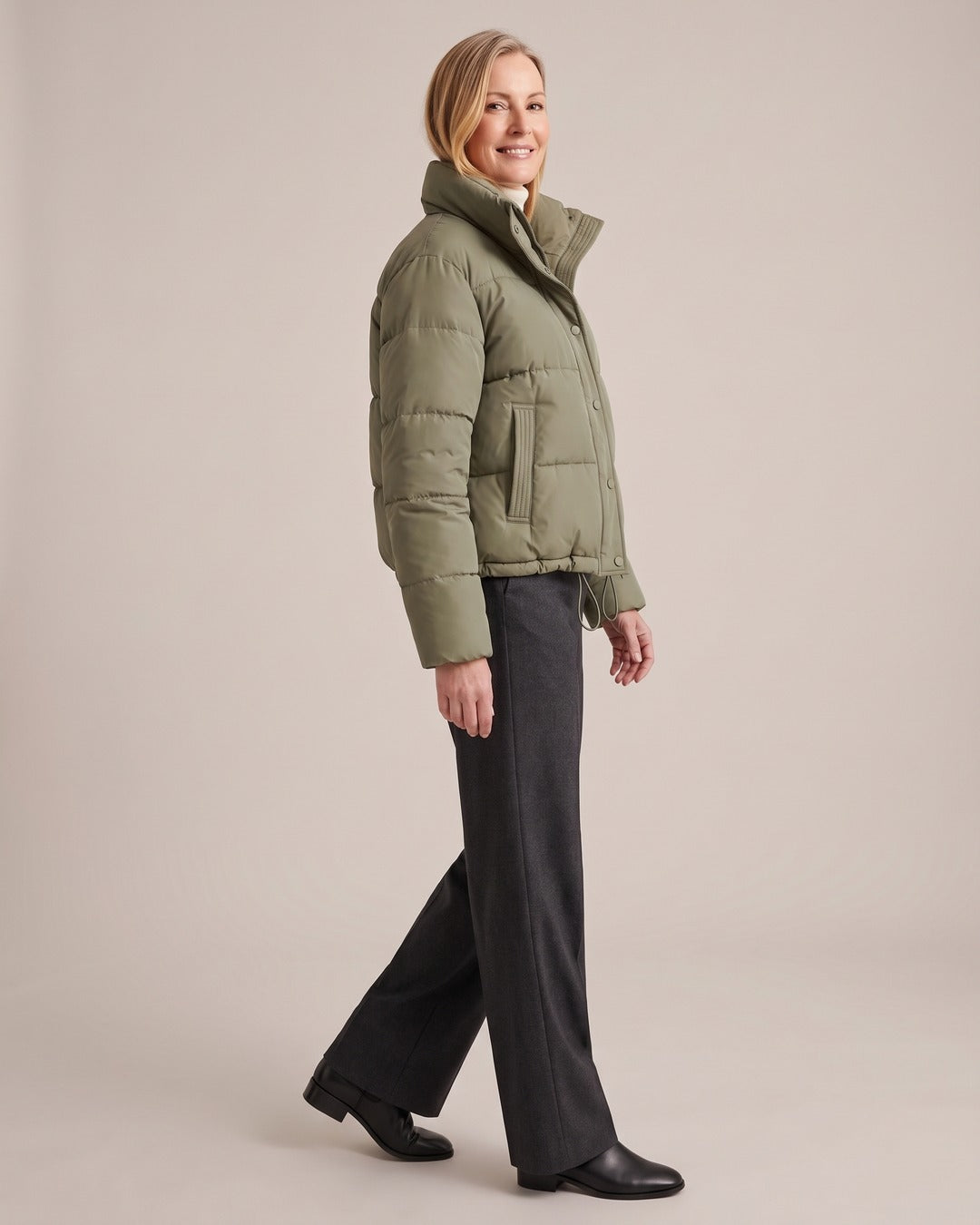 Cropped Puffer Jacket worn by a model, side view