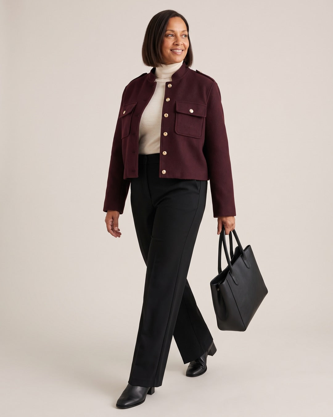 Stand-Collar Cropped Jacket with Gold Buttons worn by a model