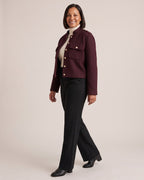 Stand-Collar Cropped Jacket with Gold Buttons worn by a model, side view