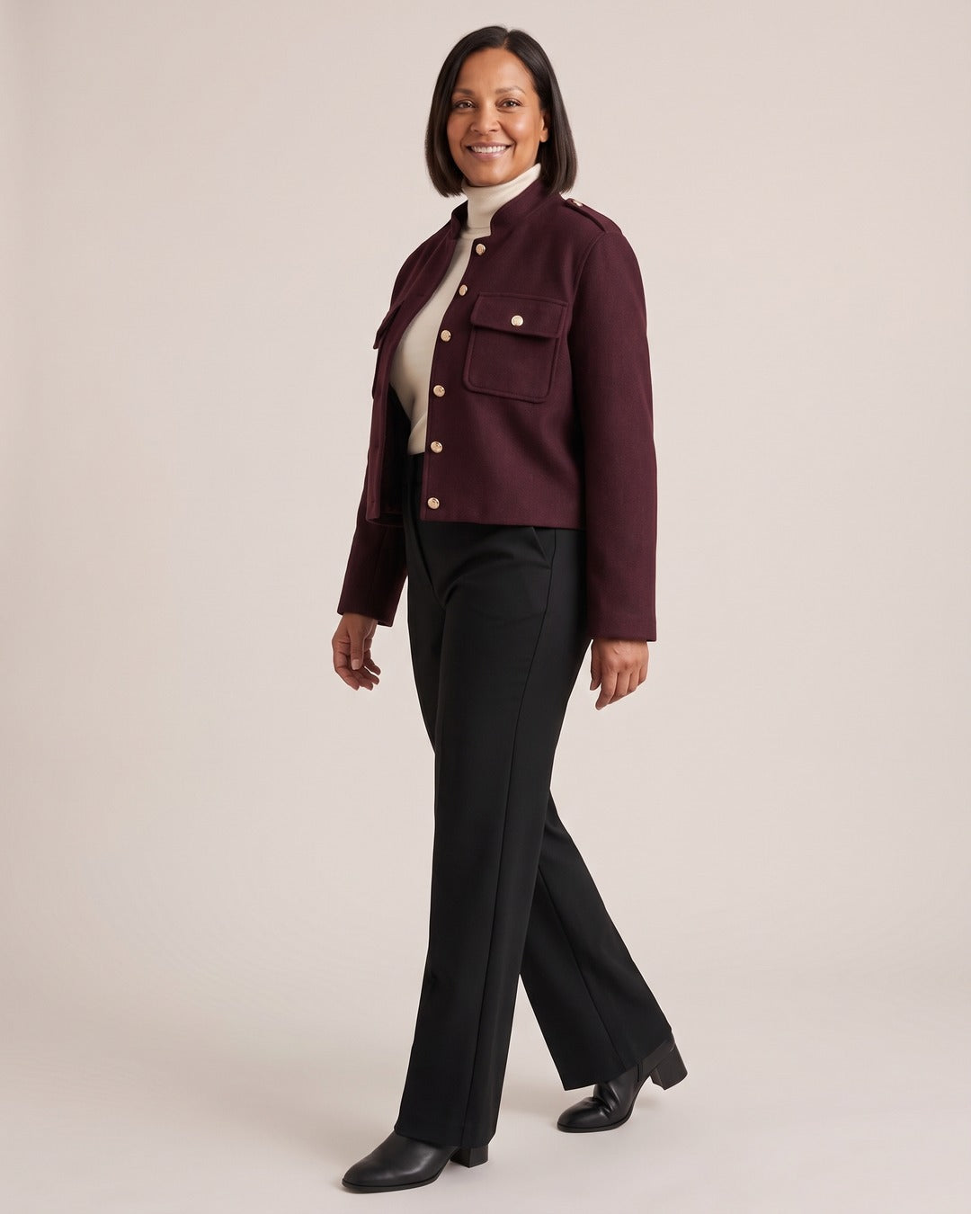 Stand-Collar Cropped Jacket with Gold Buttons worn by a model, side view