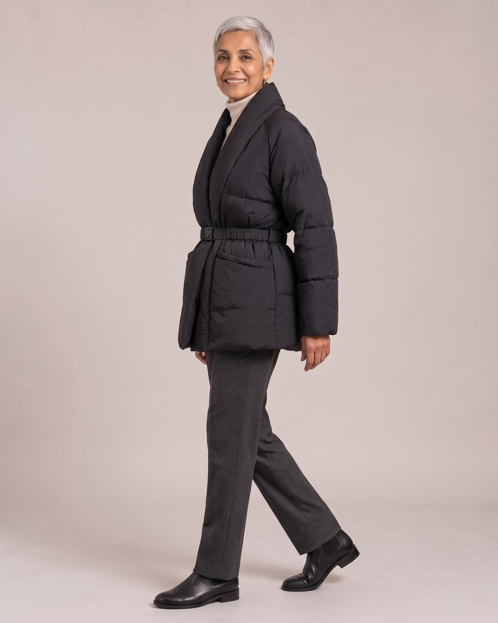 Belted V-Neck Puffer Jacket worn by a model, side view