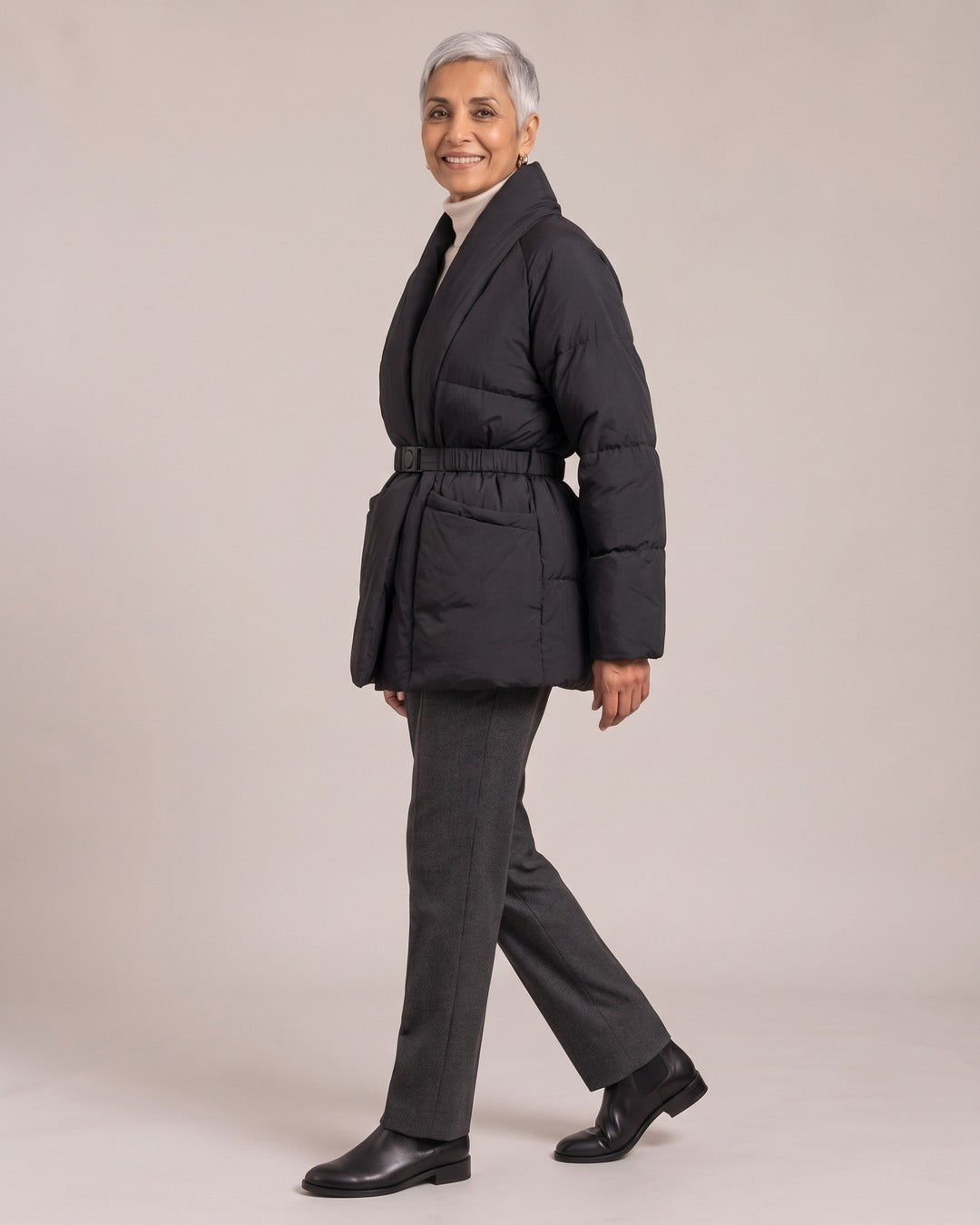 Belted V-Neck Puffer Jacket worn by a model, side view