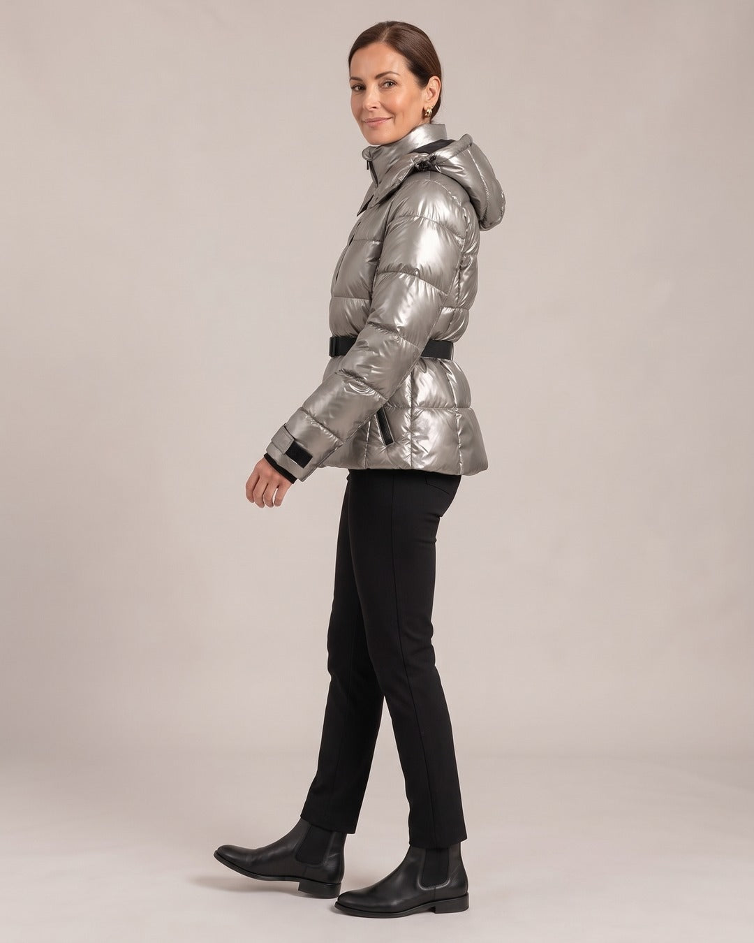 Metallic Hooded Puffer Jacket worn by a model, side view, Silver