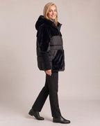 Hooded Faux-Fur Panel Puffer Jacket worn by a model, side view