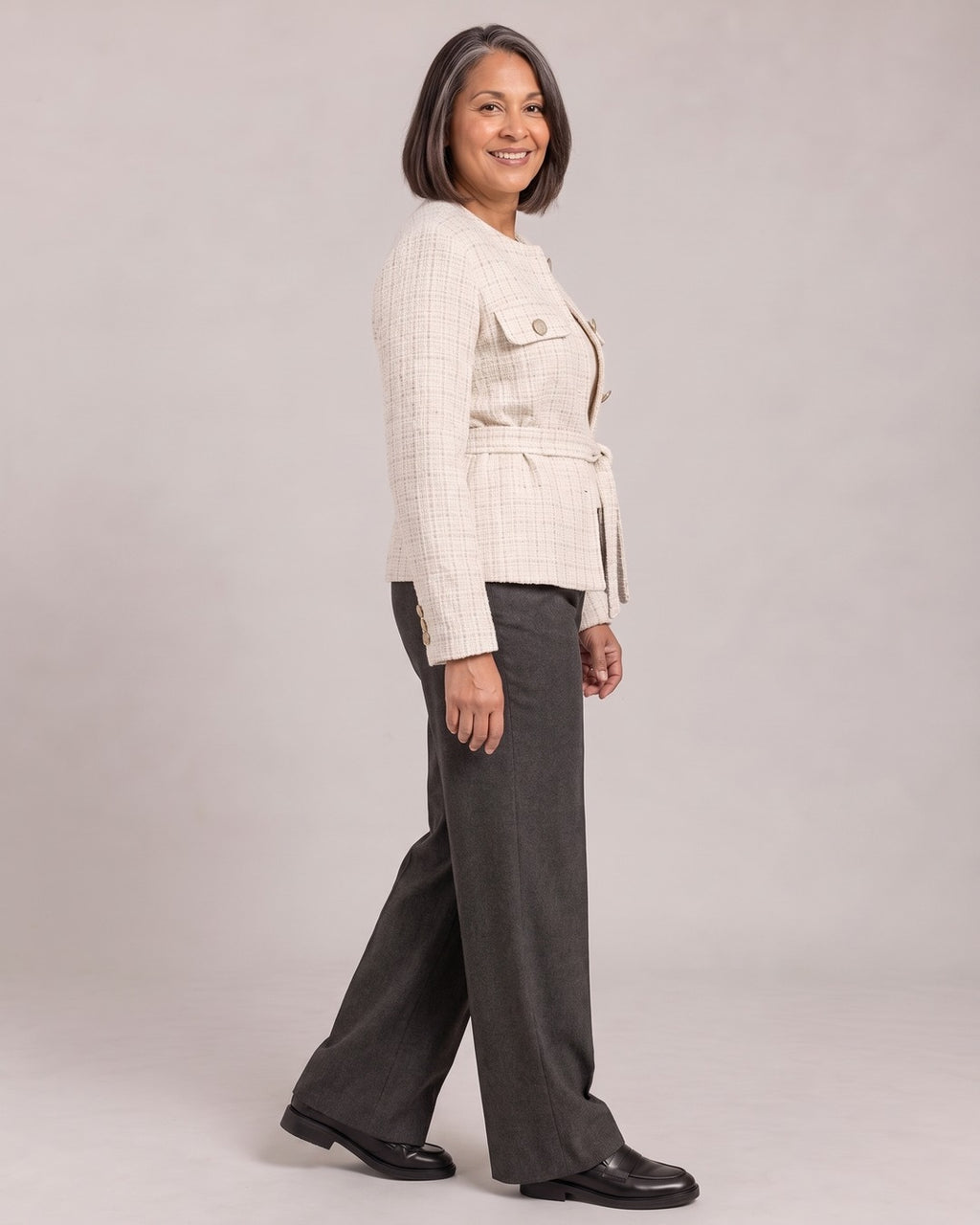 Tweed Jacket with Belt worn by a model, side view