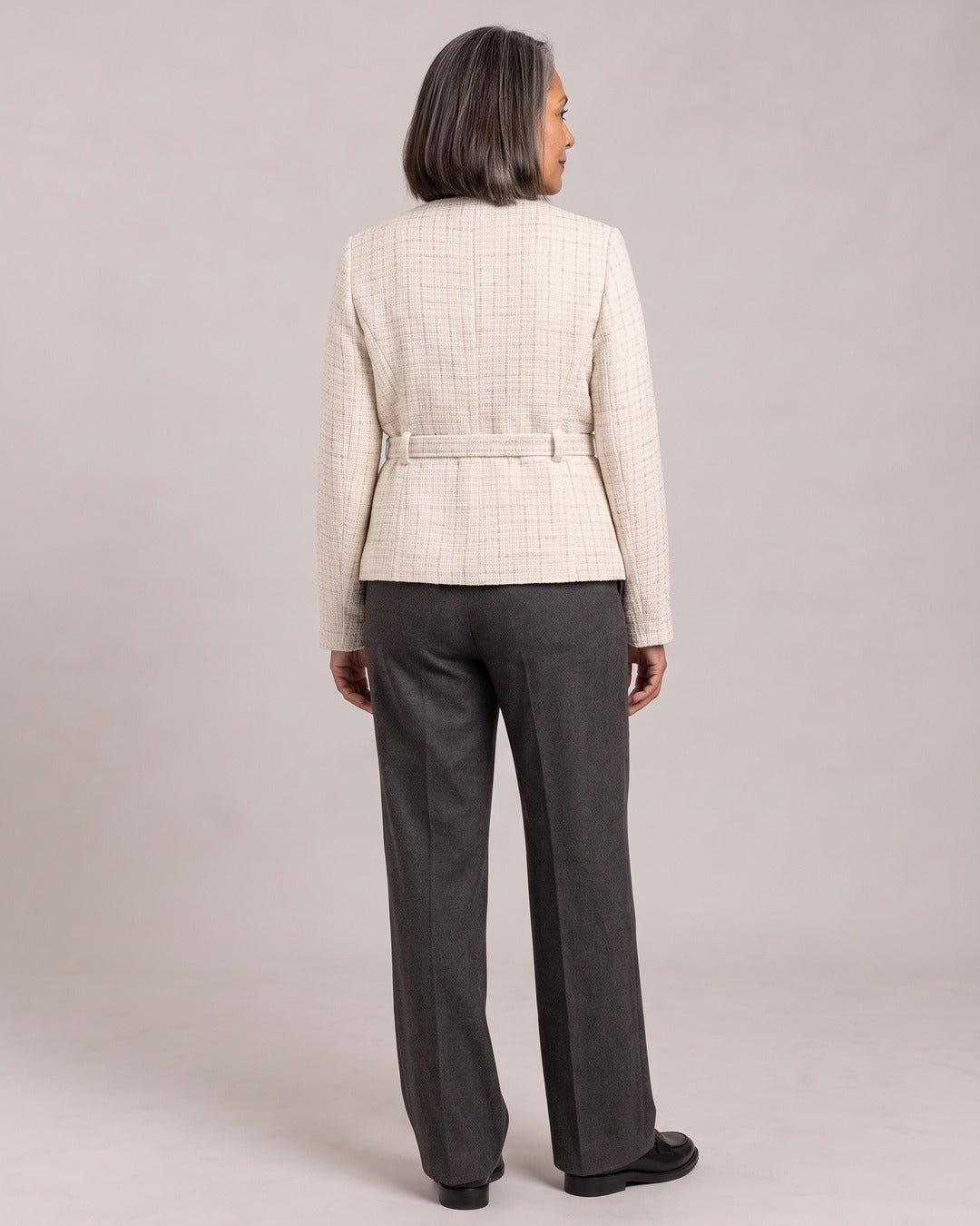 Tweed Jacket with Belt worn by a model, back view