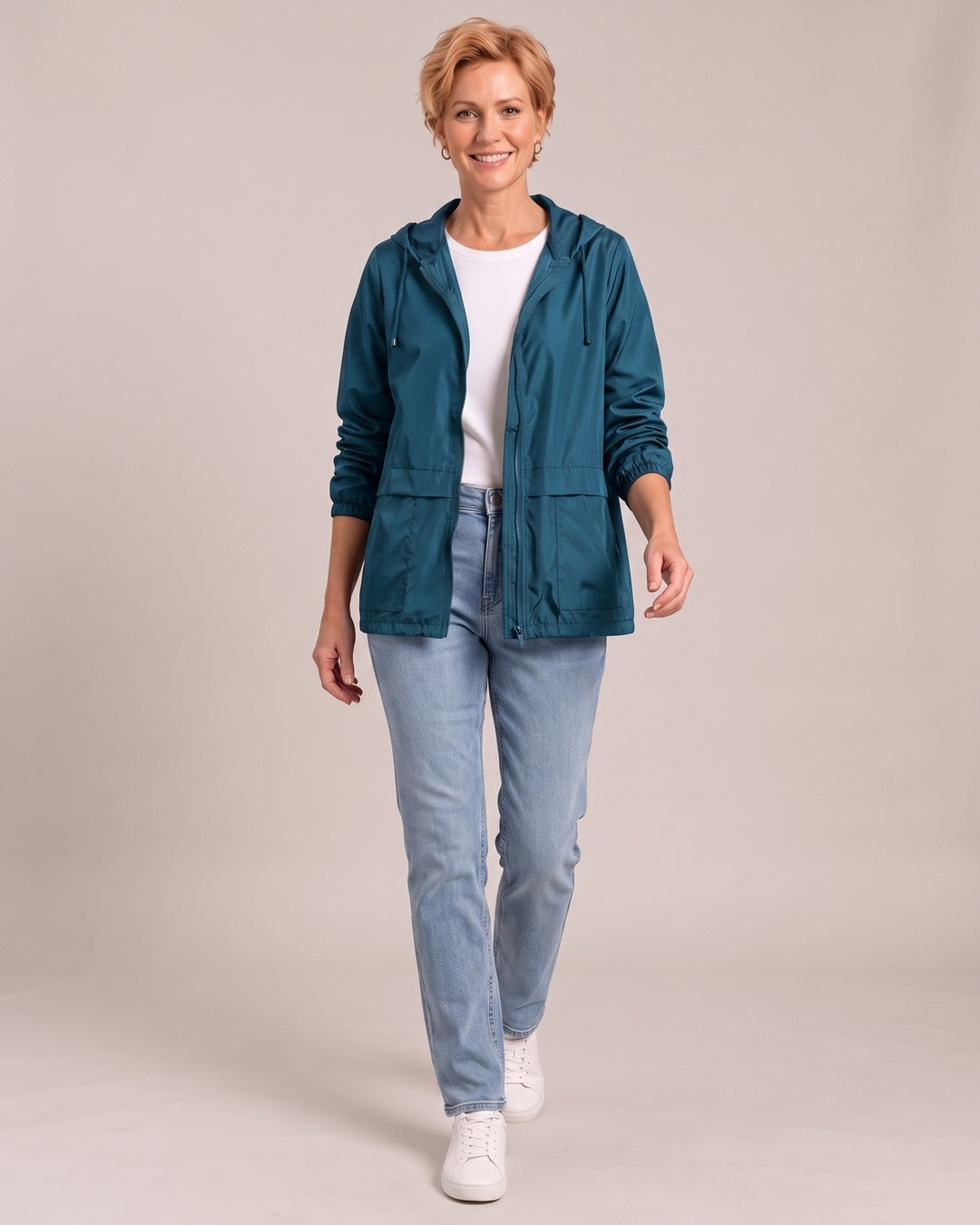 Lightweight Hooded Windbreaker Jacket worn by a model, Teal