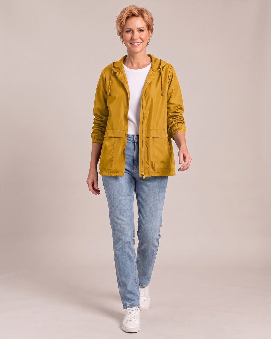 Lightweight Hooded Windbreaker Jacket worn by a model, Yellow