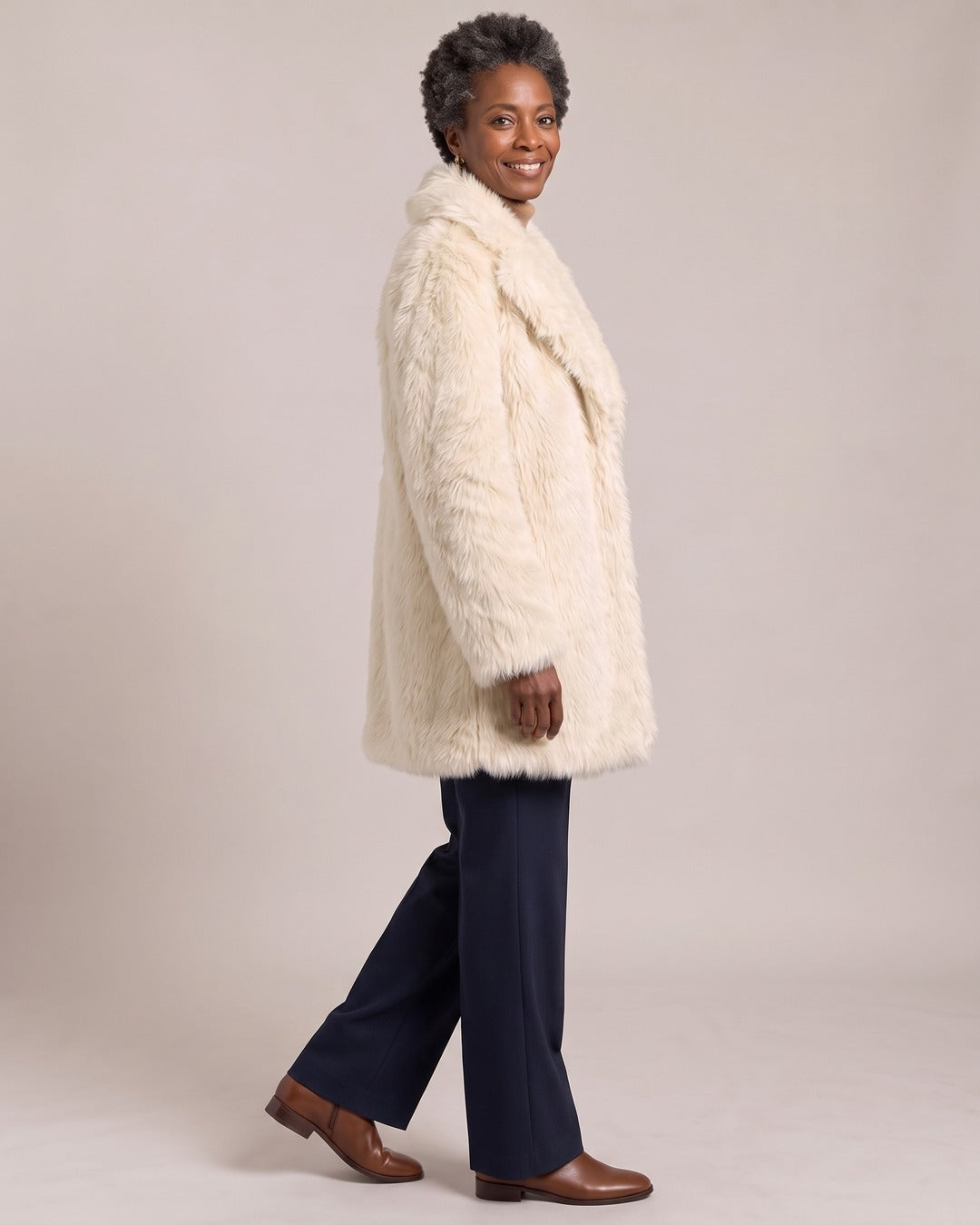 Longline Faux Fur Coat worn by a model, side view