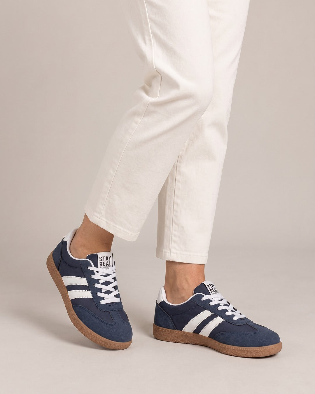 Striped Suede-Look Trainer in Navy, worn