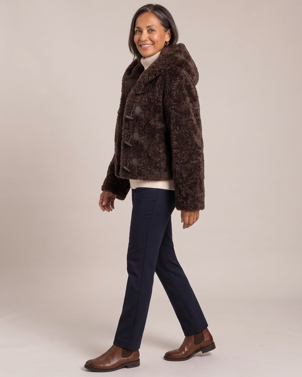 Hooded Teddy Toggle Jacket worn by a model, side view