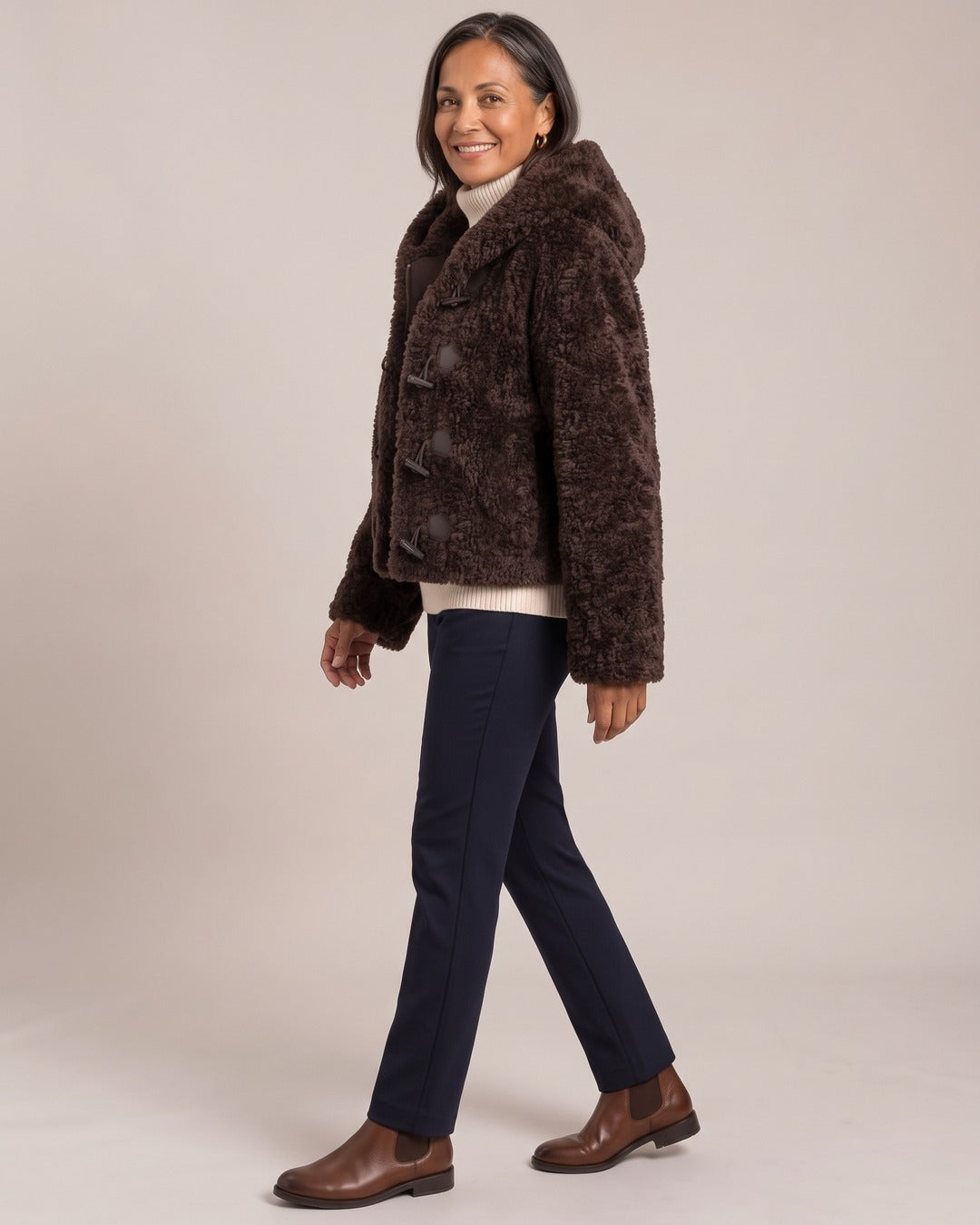 Hooded Teddy Toggle Jacket worn by a model, side view