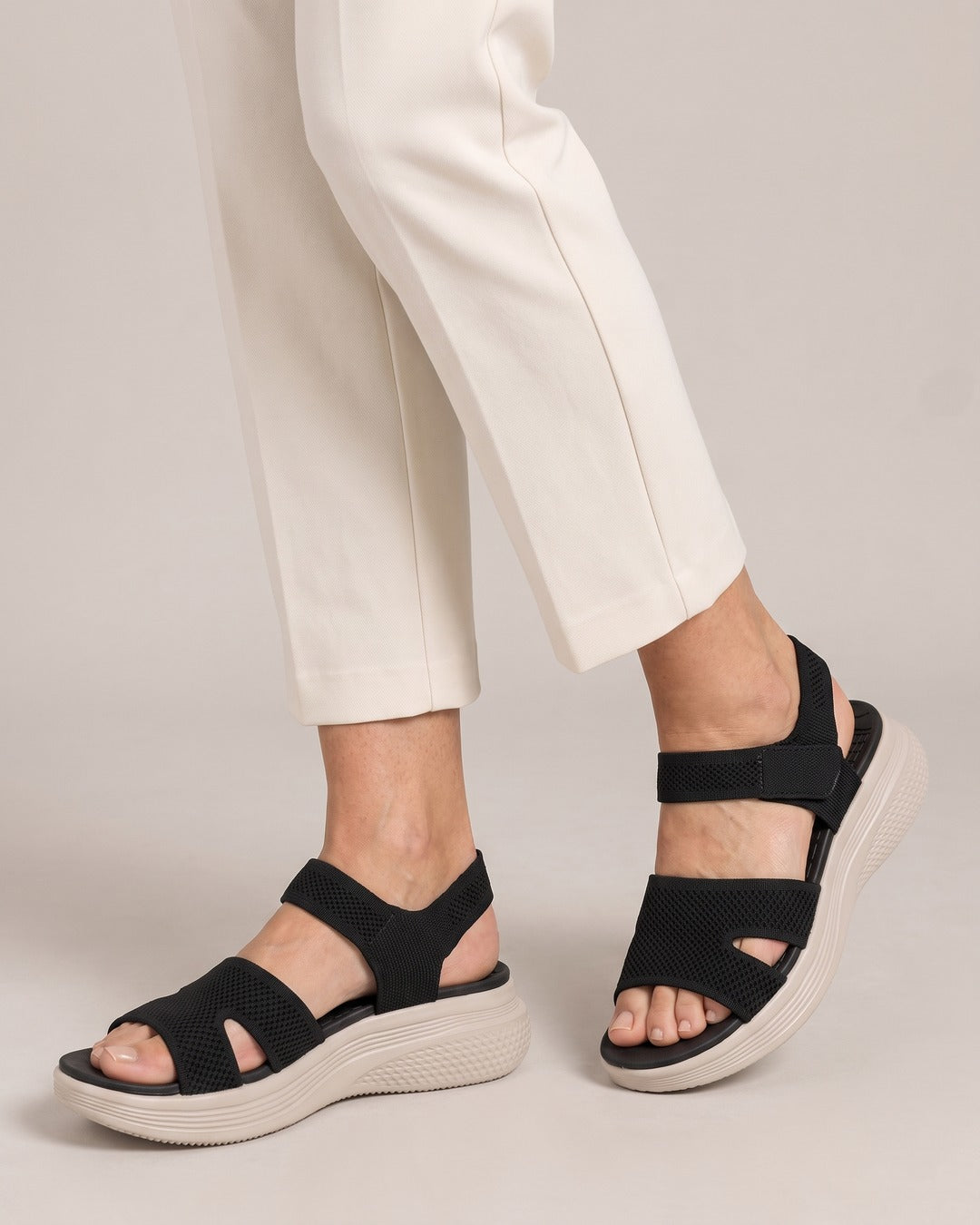Stretch-Knit Wedge Sandal in Black, worn