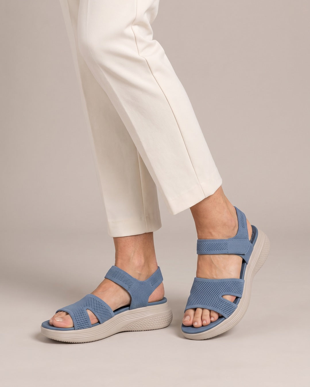 Stretch-Knit Wedge Sandal in Blue, worn