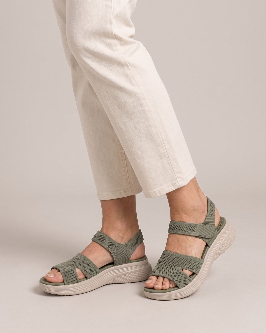 Stretch-Knit Wedge Sandal in Green, worn