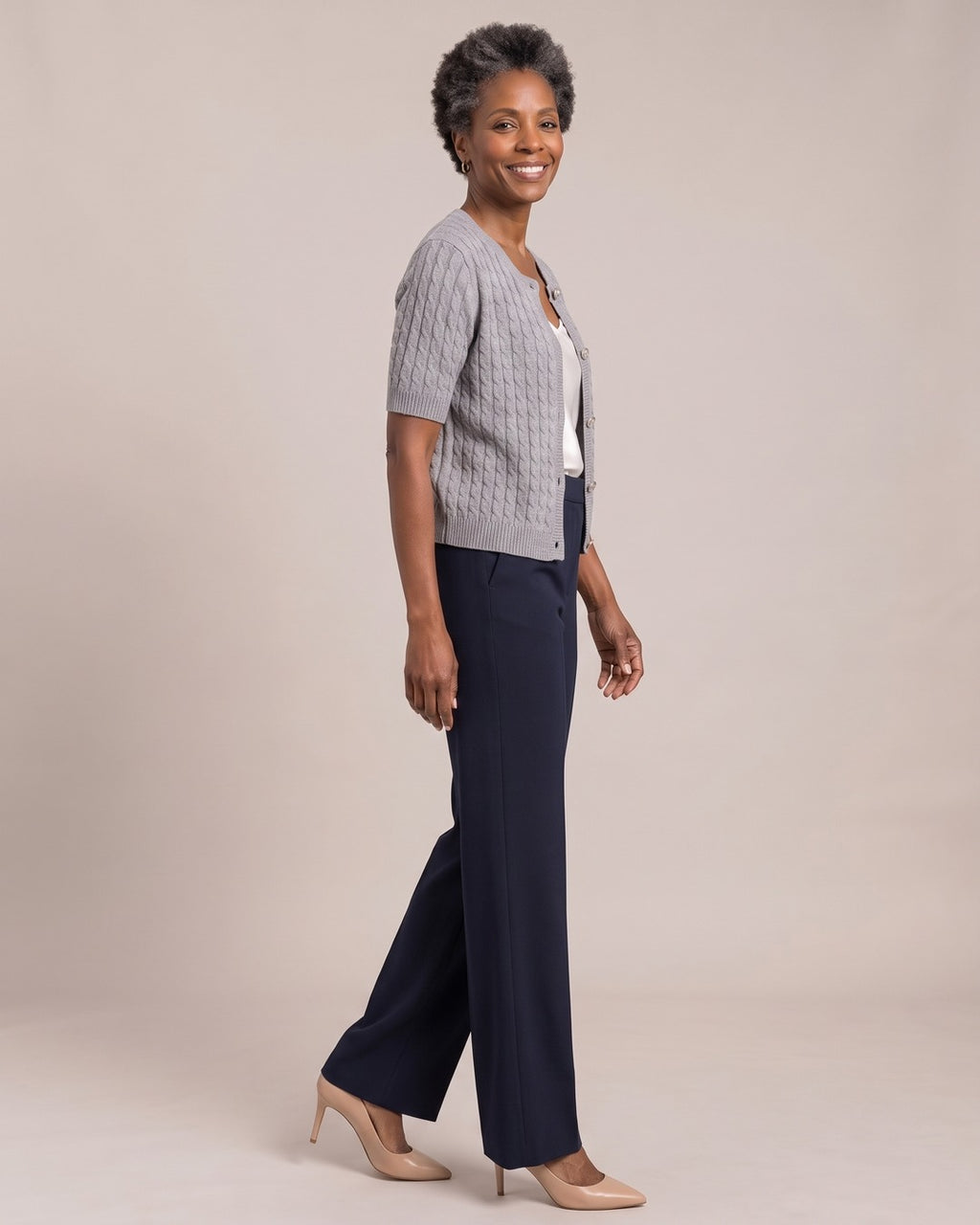 Cable-Knit Short-Sleeve Cardigan worn by a model, side view
