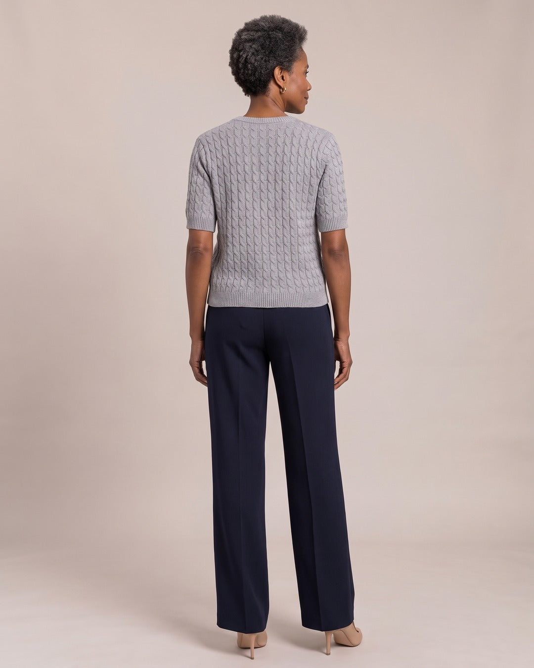 Cable-Knit Short-Sleeve Cardigan worn by a model, back view