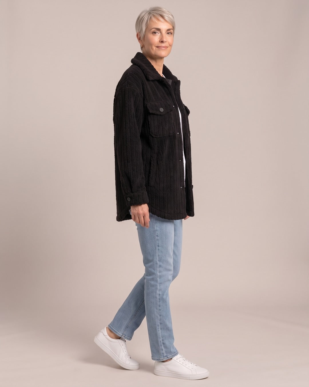 Oversized Teddy Coat worn by a model, side view, Black