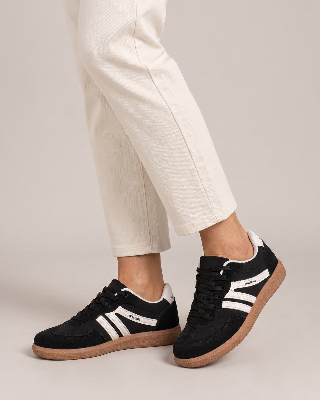 Suede-Look Two-Stripe Trainer in Black, worn