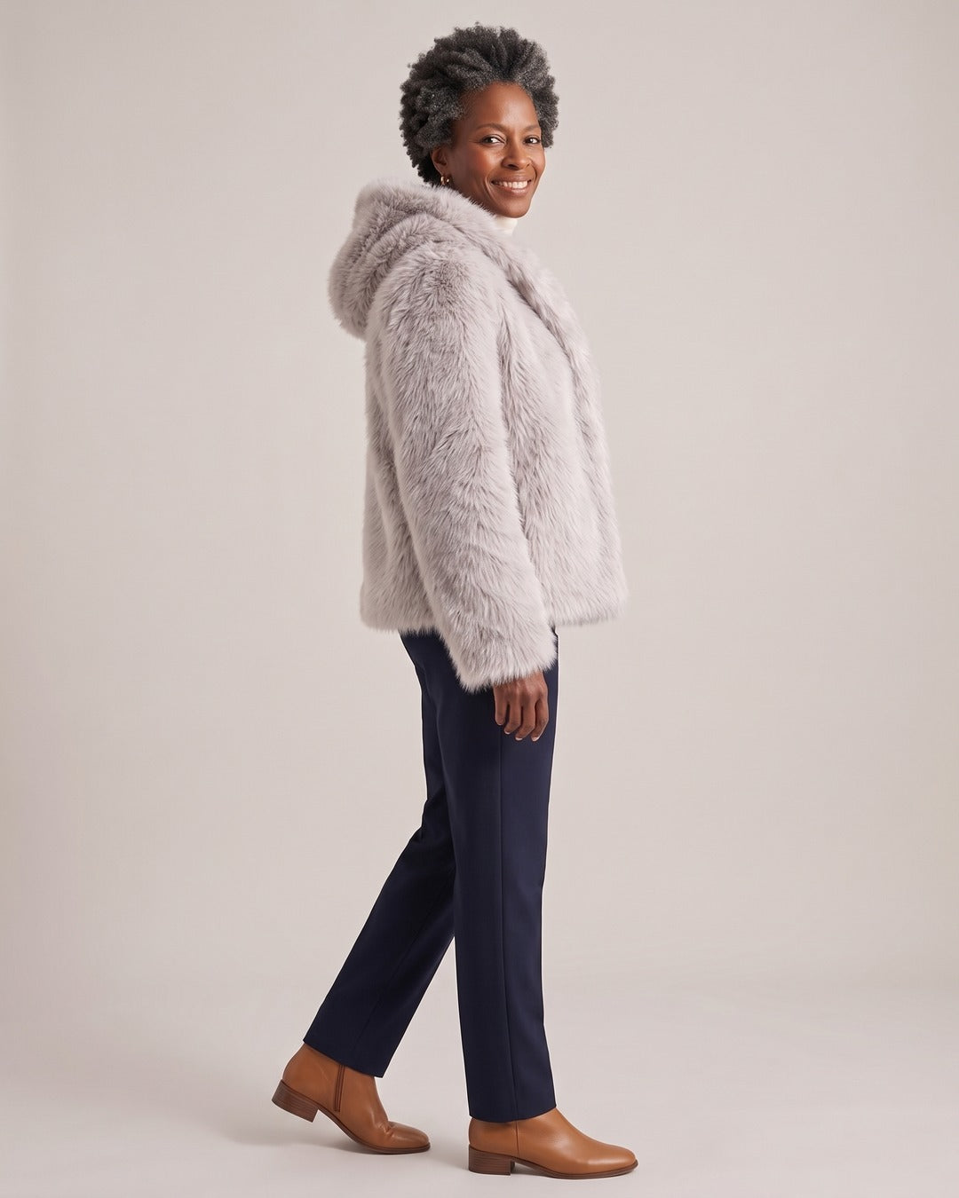 Hooded Faux Fur Jacket worn by a model, side view