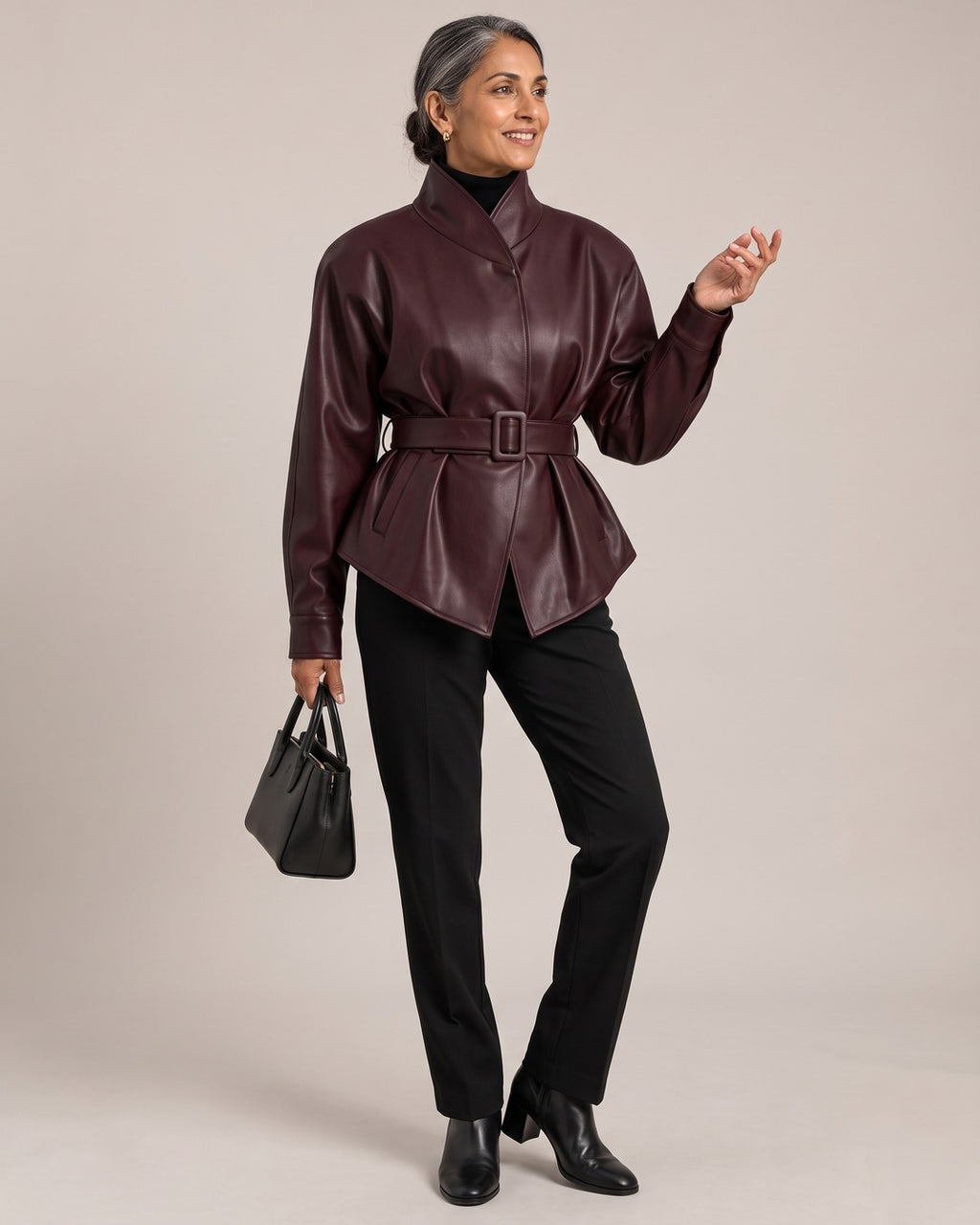 Belted Leather-Look Stand-Collar Jacket worn by a model
