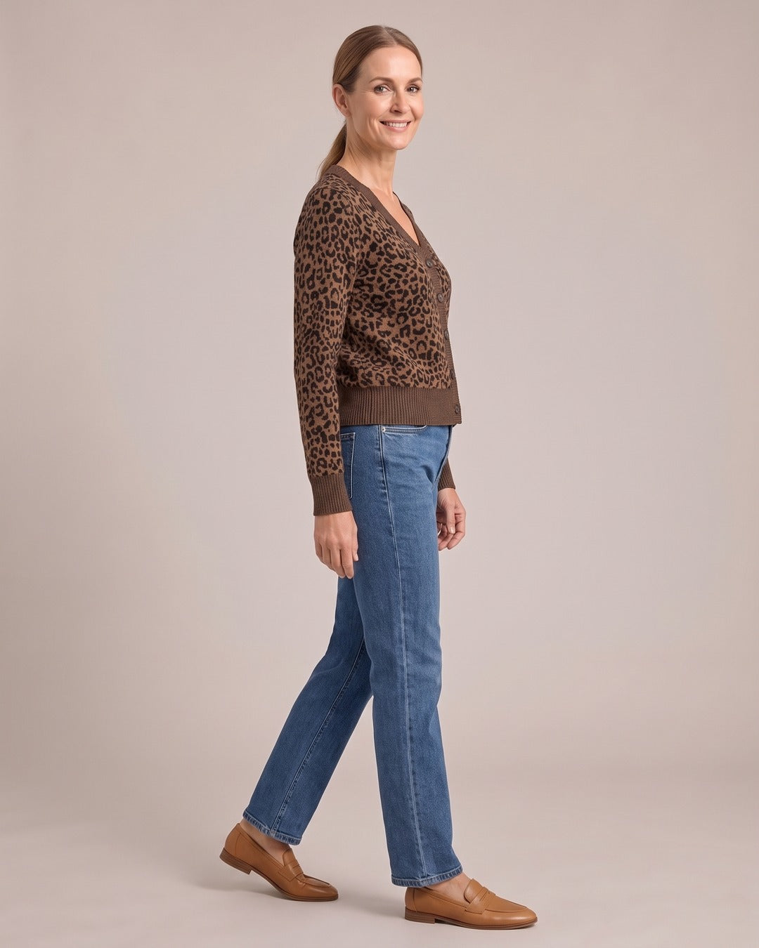 Molly | Leopard Knit Cardigan worn by a model, side view