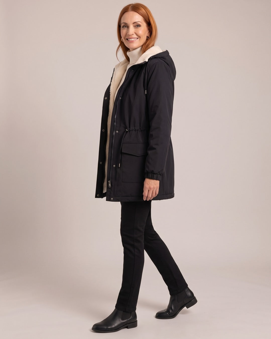 Sabine | Hooded Long Parka worn by a model, side view