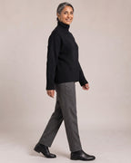 Chunky Turtleneck Jumper worn by a model, side view