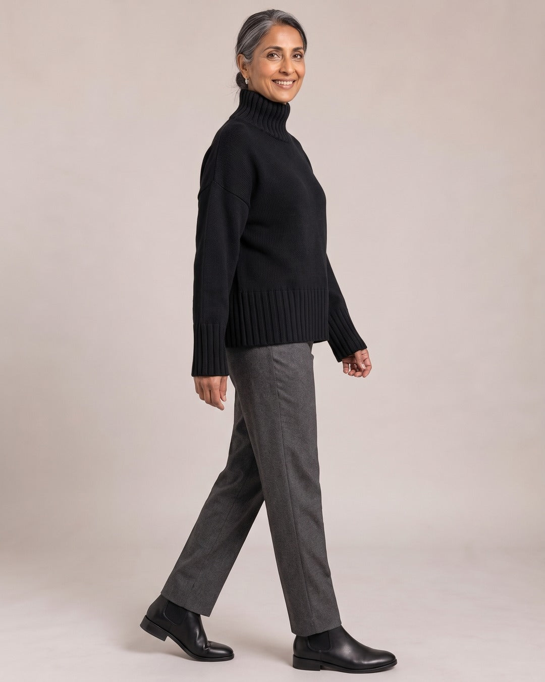 Chunky Turtleneck Jumper worn by a model, side view