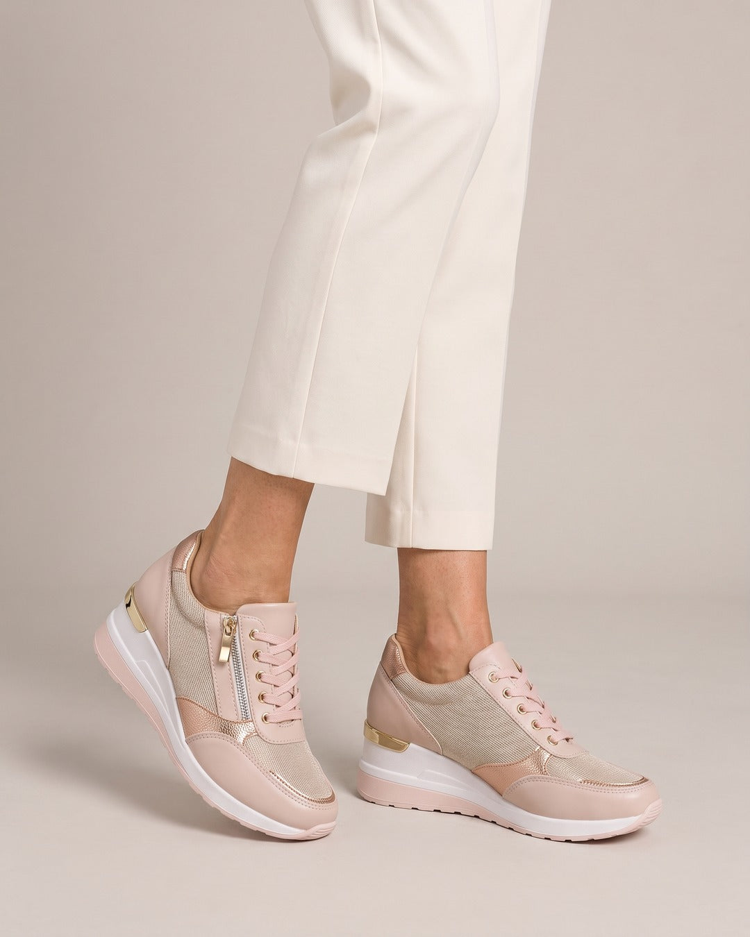 Metallic Side-Zip Wedge Trainer in Rose, worn