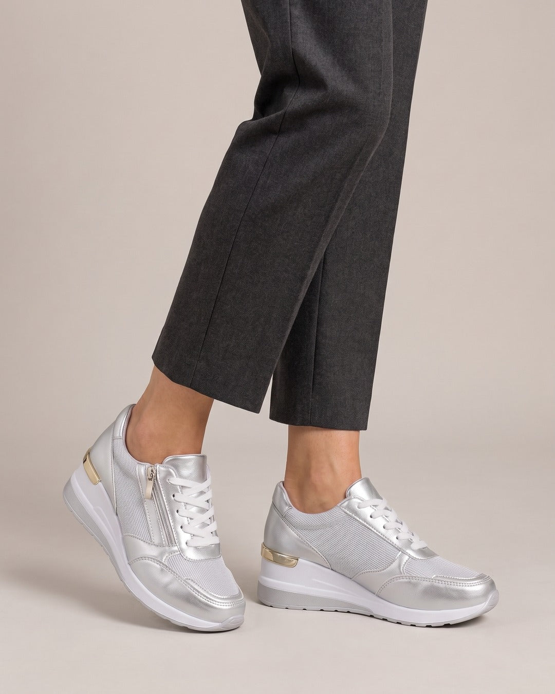 Metallic Side-Zip Wedge Trainer in Silver, worn