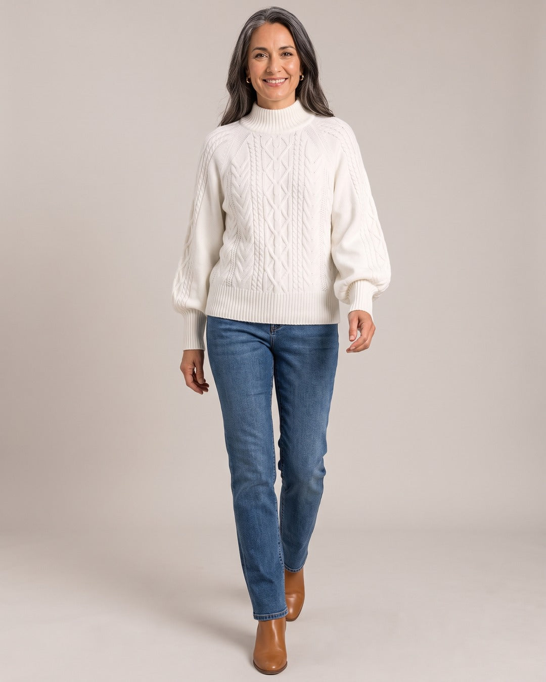 Cable Knit Roll-Neck Jumper worn by a model