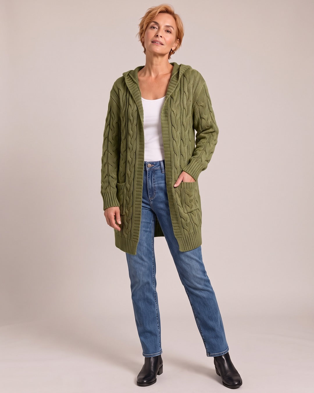 Cable Knit Cardigan worn by a model, Green