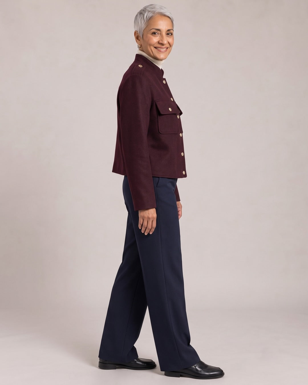 Military Cropped Jacket with Gold Buttons worn by a model, side view